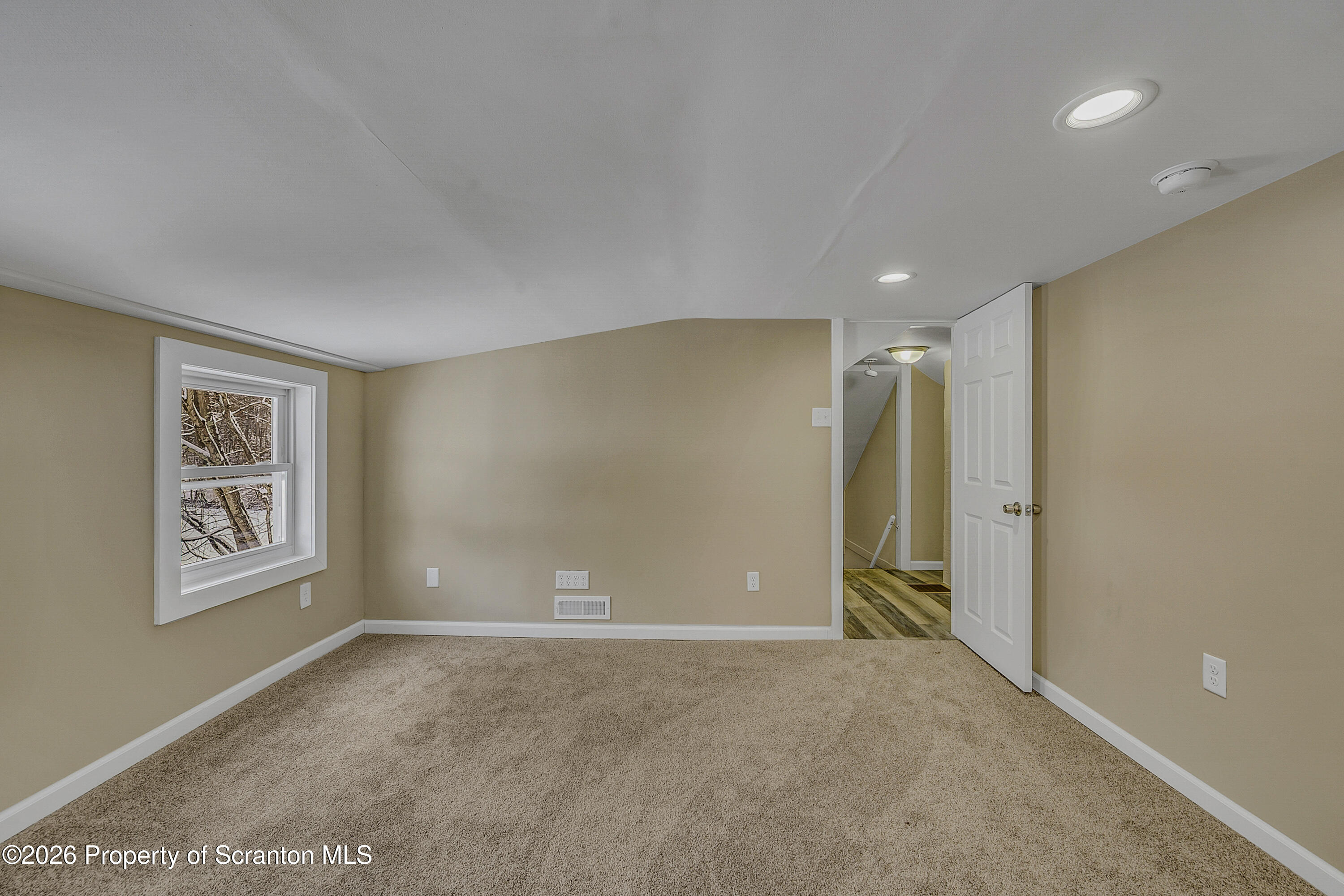 642 Bodle Road Wyoming, PA 18644 - Photo 25 of 33 a view of an empty room with a window
