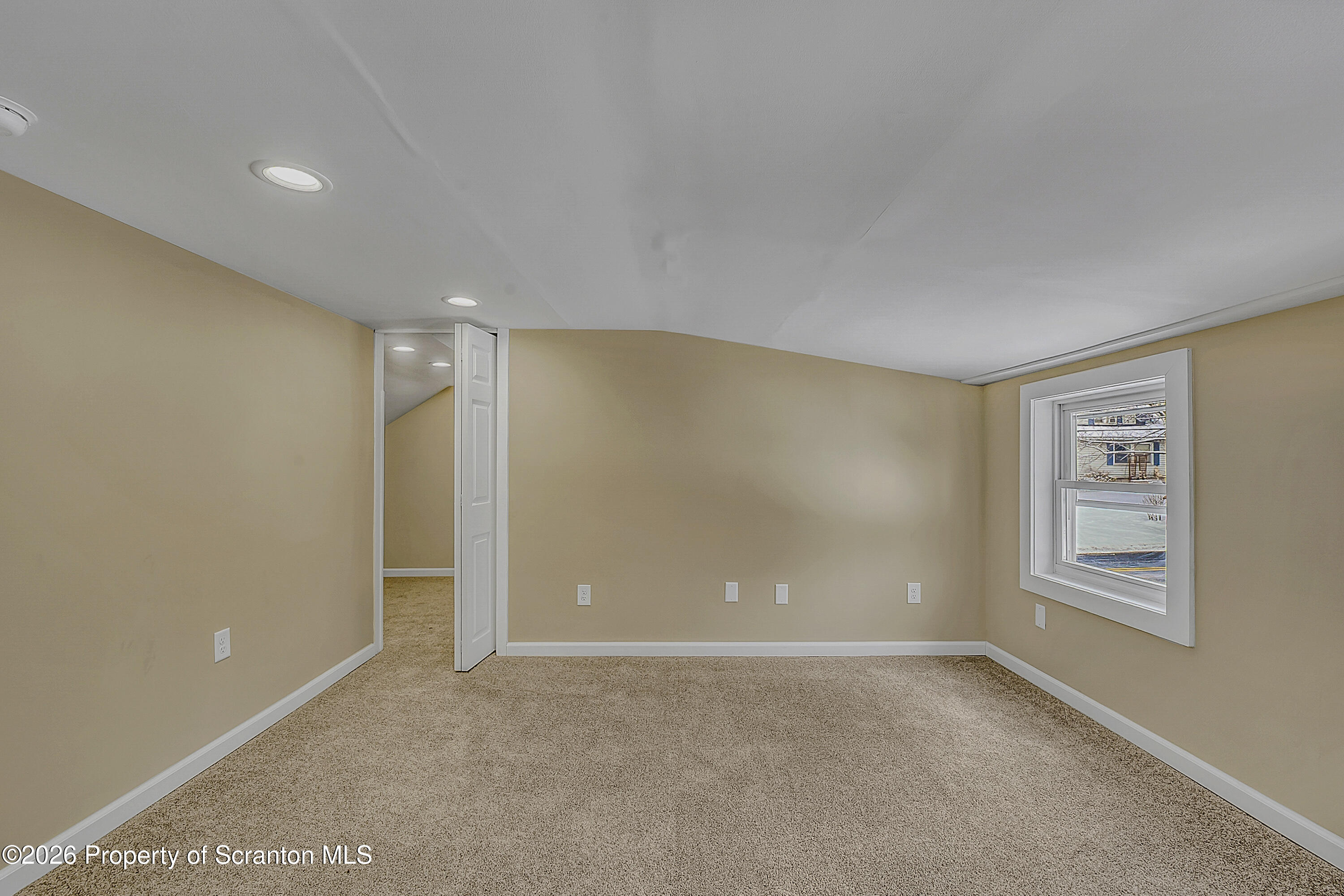642 Bodle Road Wyoming, PA 18644 - Photo 26 of 33 a view of an empty room with a window