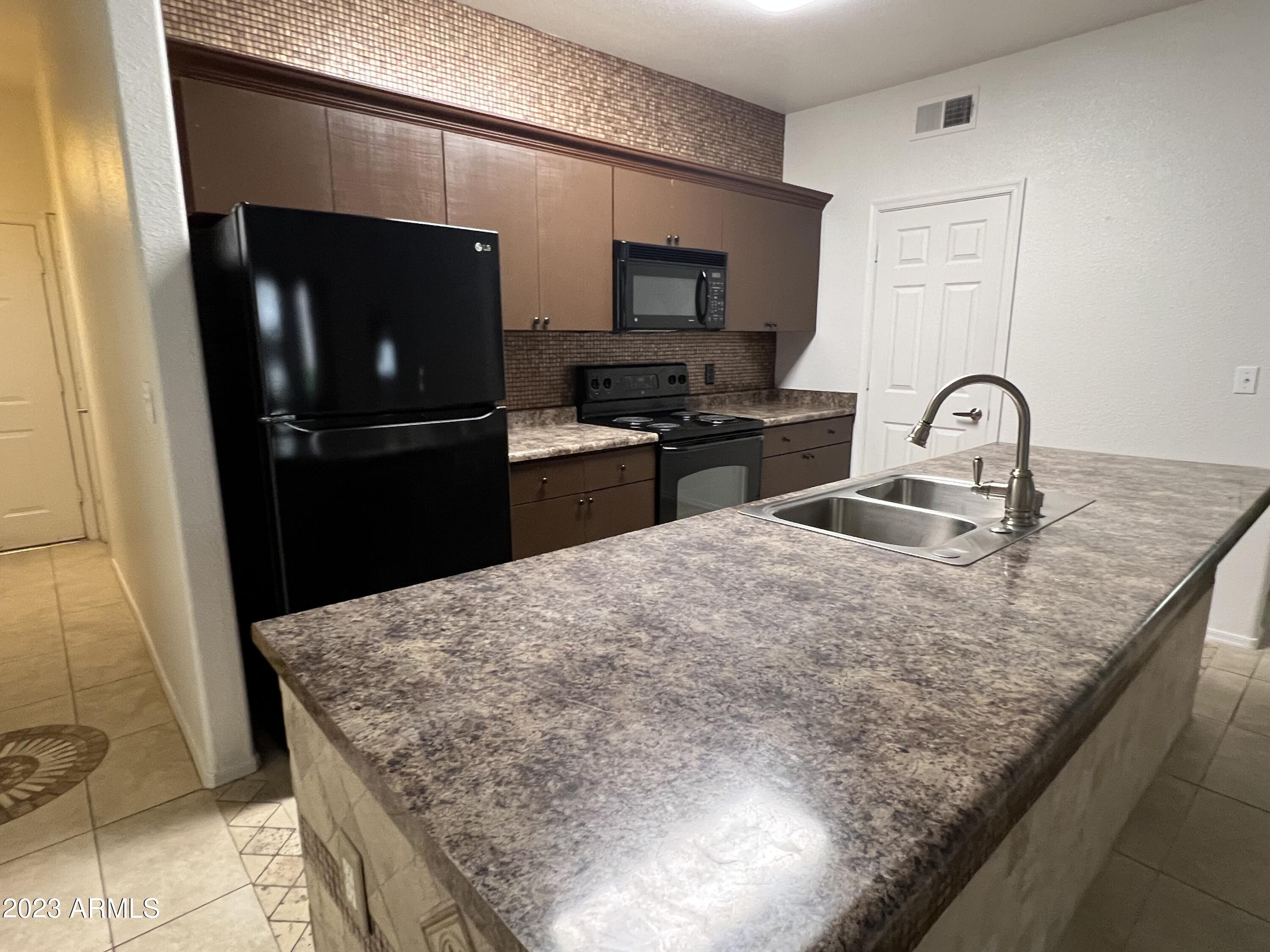 18416 North Cave Creek Road, Unit 1059 Phoenix, AZ 85032 - Photo 12 of 45 Island with Breakfast Bar