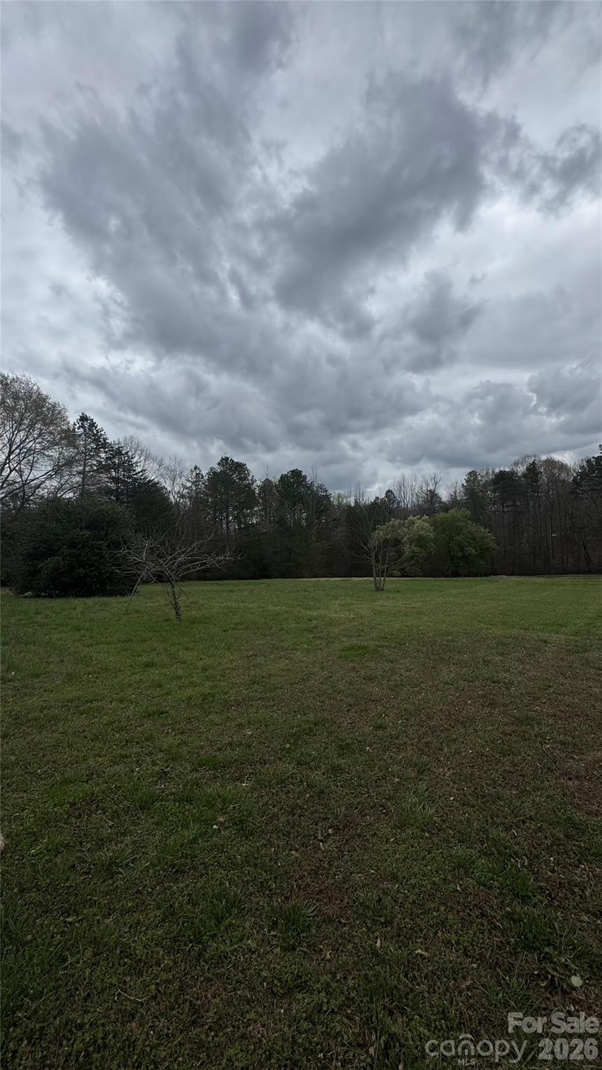 0 Lewis Road Gastonia, NC 28052 - Photo 11 of 15 a view of a lake from a yard