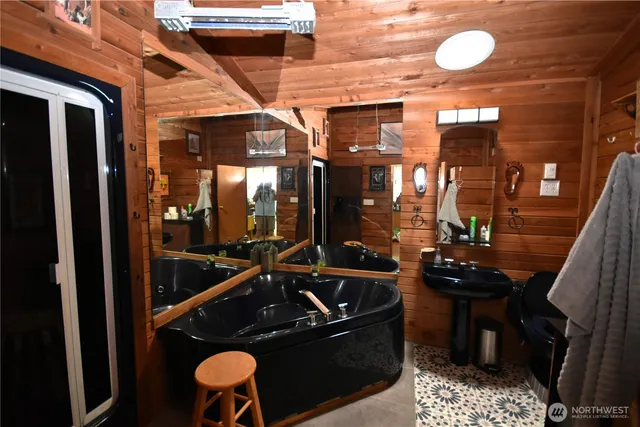 a view of two chairs in the balcony