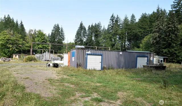 a view of a car parked in front of a house