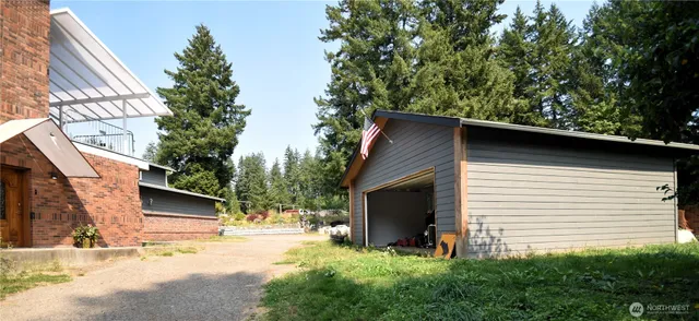 a view of a door and a window