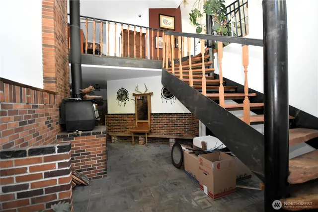 a view of a living room and entry way