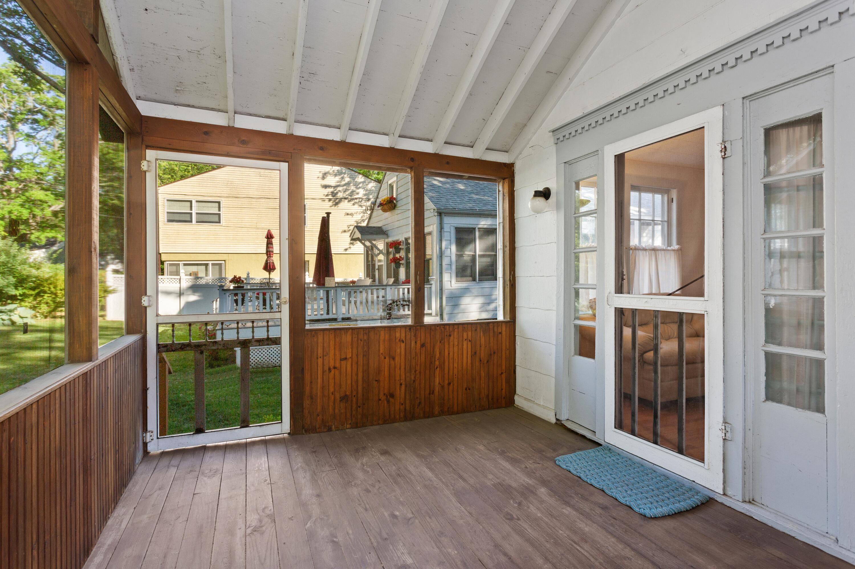 15552 Victor Road, Unit 3 Union Pier, MI 49129 - Photo 2 of 20 Screened porch entrance