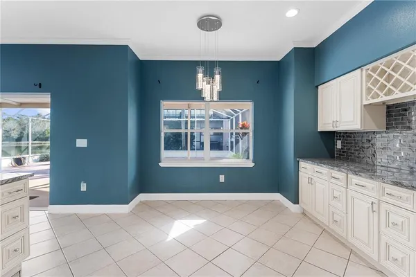 a view of a livingroom with a kitchen