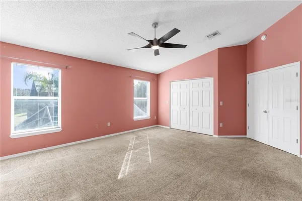 a view of a livingroom with a ceiling fan