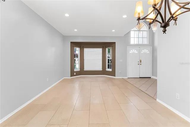 a view of an empty room and window