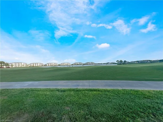 a view of a glass door and an empty room