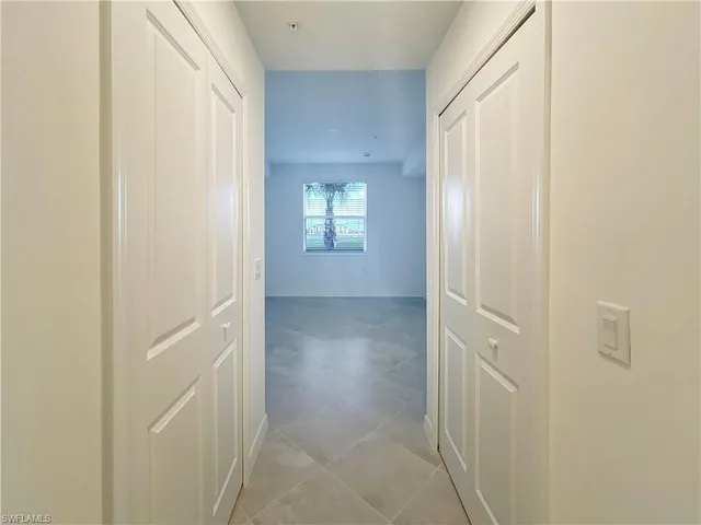 an empty room with an entryway