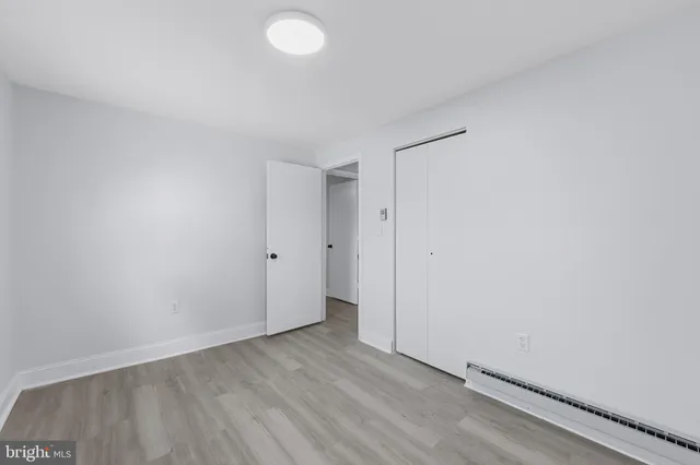 a bathroom with a sink toilet and vanity