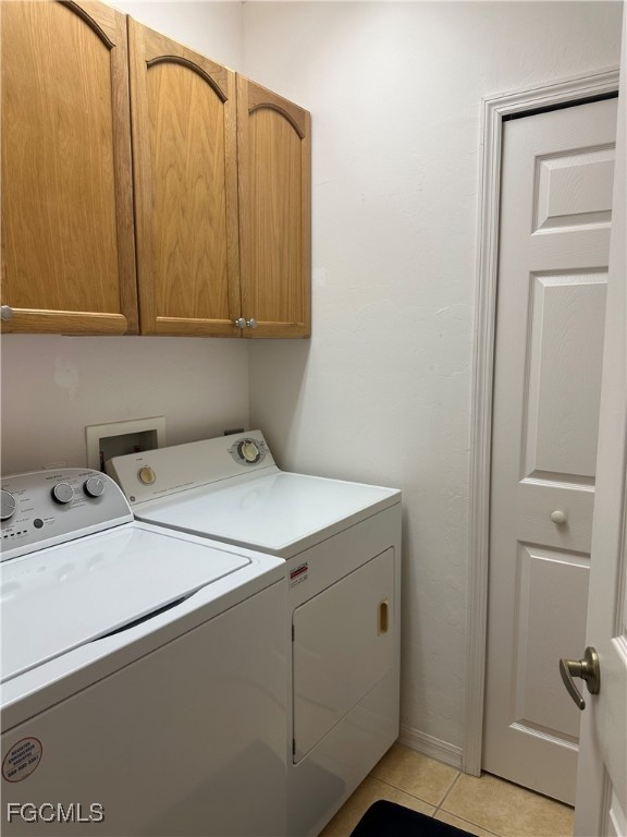2280 Somerset Ridge Drive, Unit 204 Lehigh Acres, FL 33973 - Photo 40 of 41 a utility room with dryer and washer