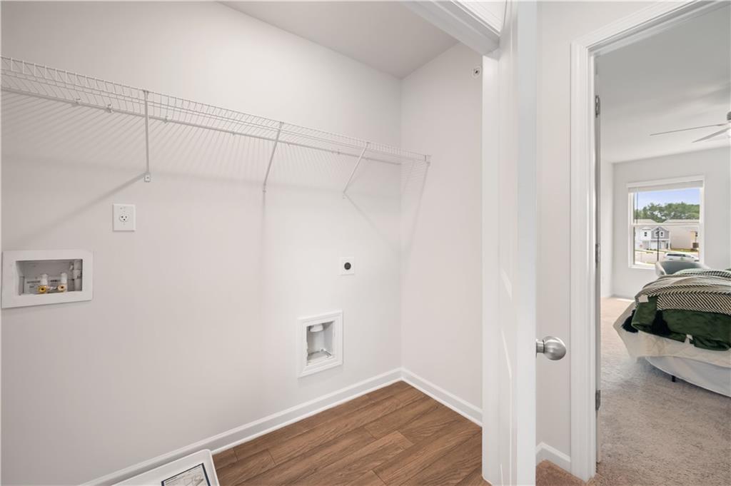 9437 Maple Grove Lane Jonesboro, GA 30238 - Photo 21 of 32 a view of small space with racks on the wall