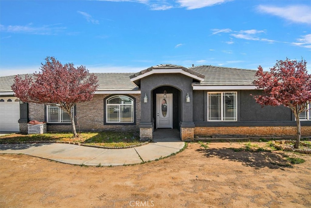 8141 Arrowhead Road Phelan, CA 92371 - Photo 1 of 1 a view of a house with a yard