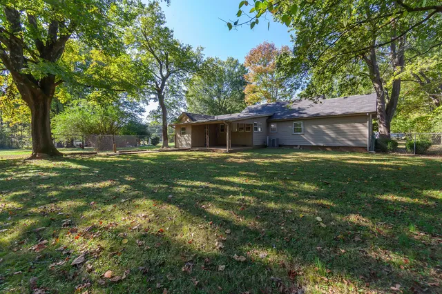 a view of a house with a big yard