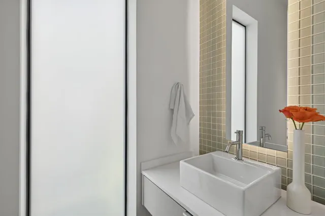 a bathroom with a sink and a bathtub