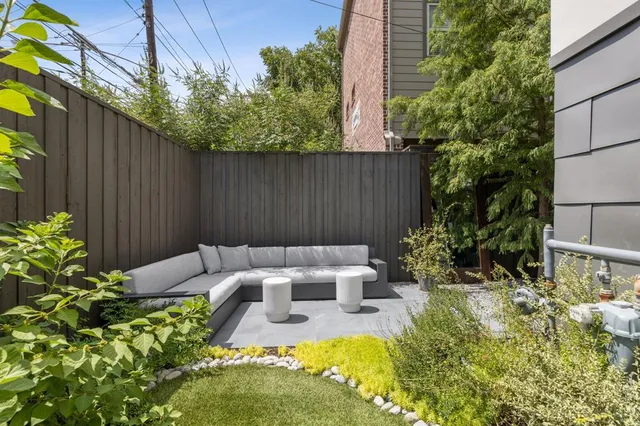 a view of a backyard with swimming pool