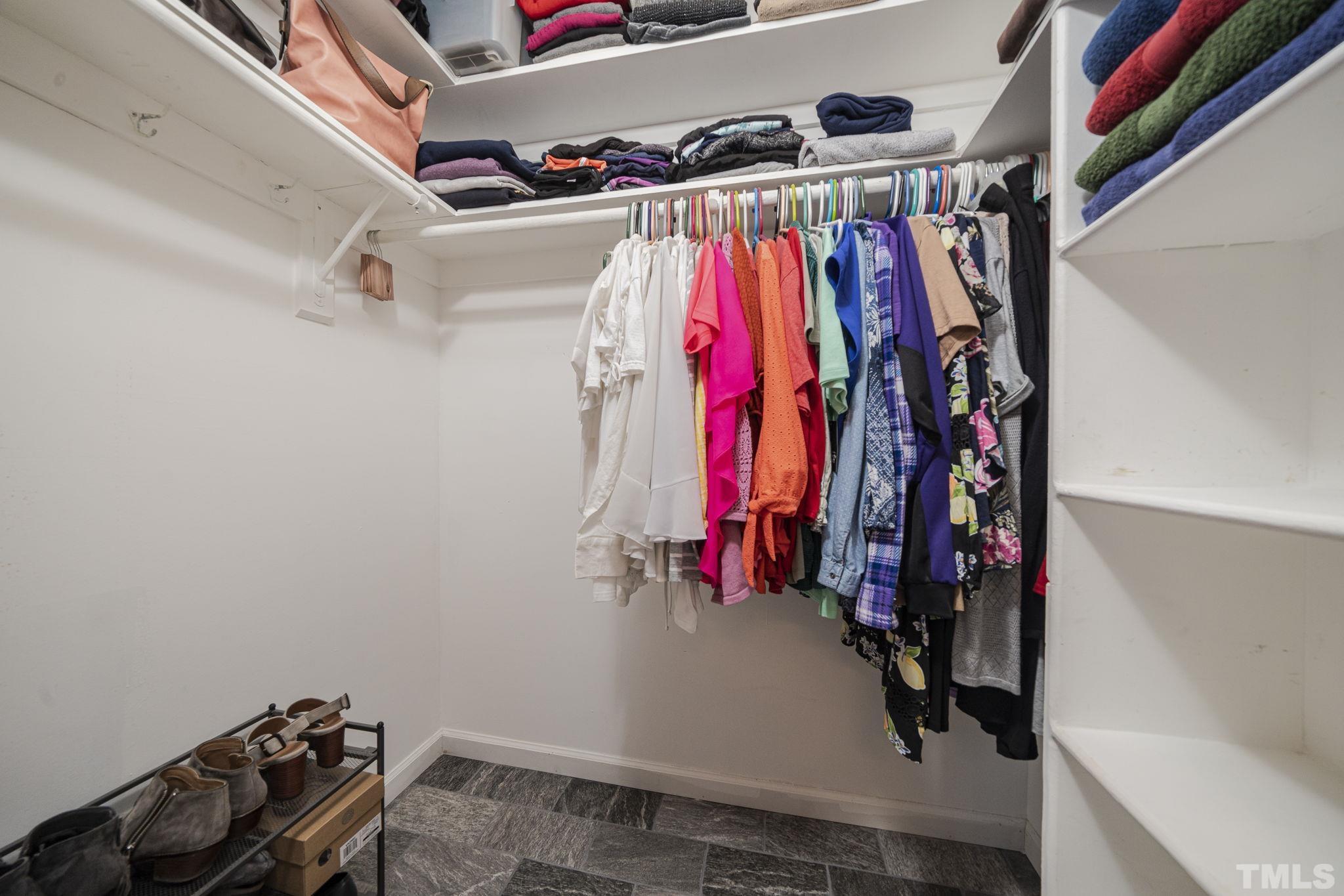 3500 Cartway Lane Raleigh, NC 27616 - Photo 16 of 35 a view of walk in closet with clothes and shoes