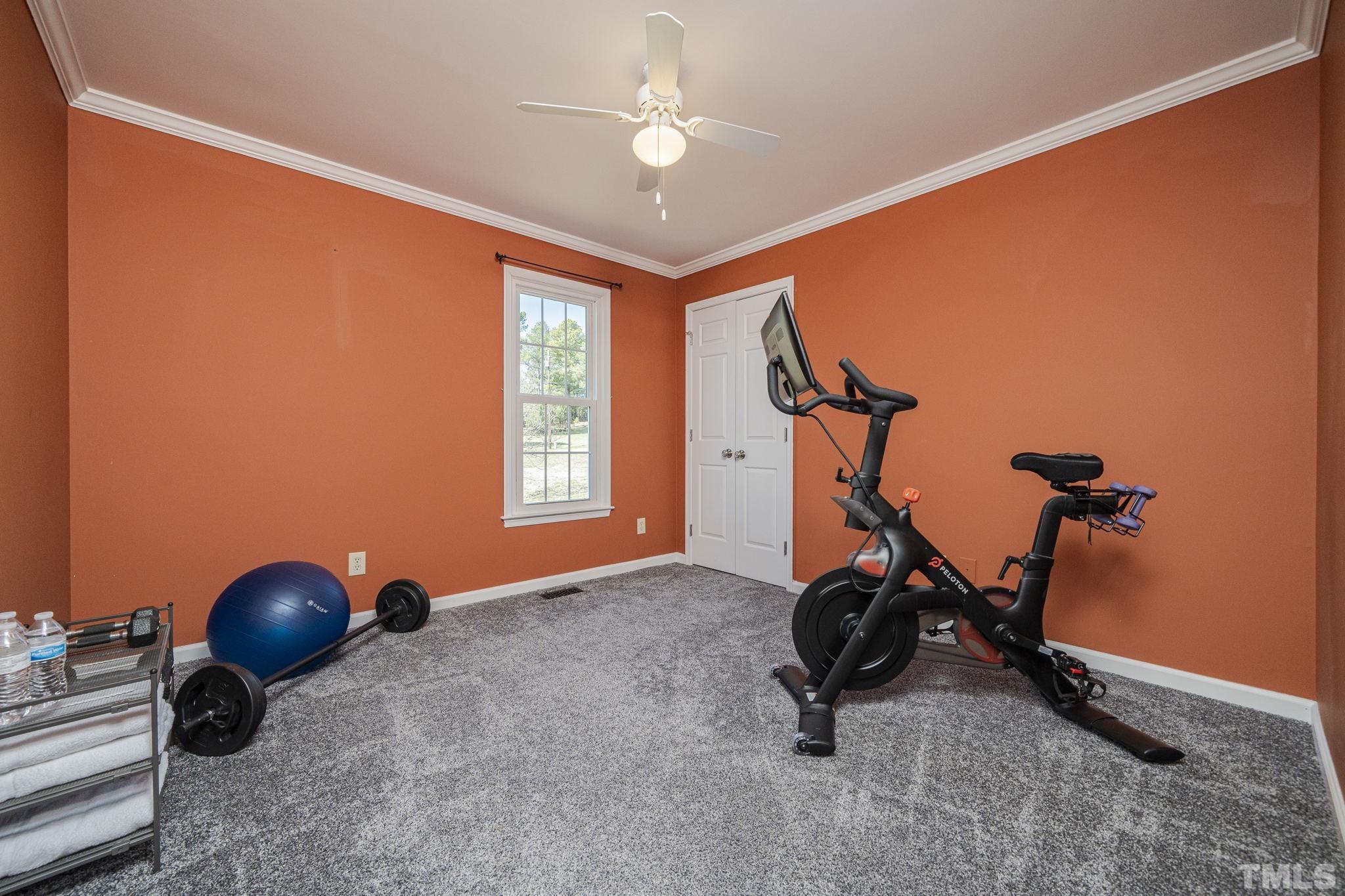 3500 Cartway Lane Raleigh, NC 27616 - Photo 18 of 35 a room with gym equipment and windows