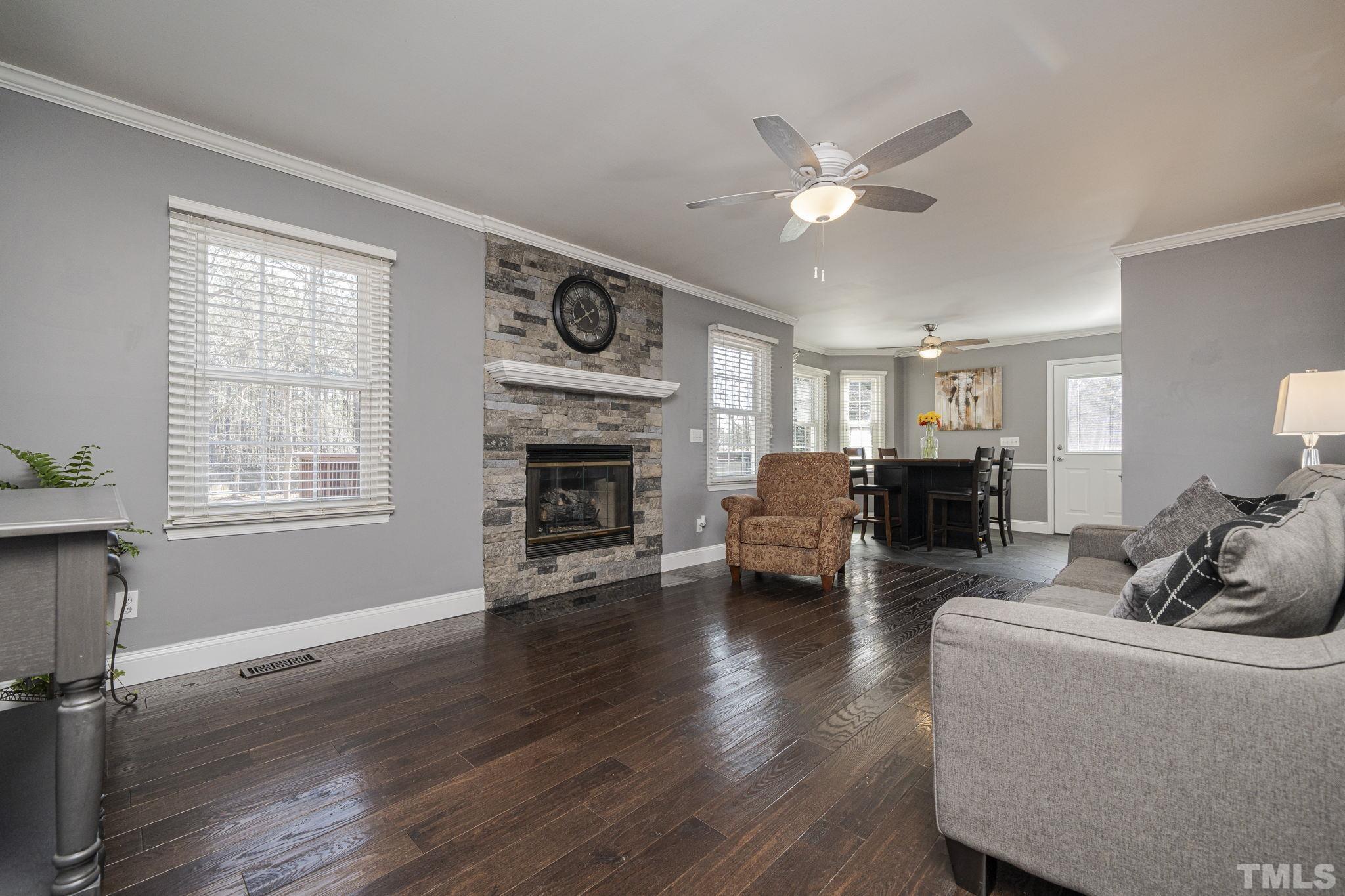 3500 Cartway Lane Raleigh, NC 27616 - Photo 3 of 35 a living room with furniture and a fireplace