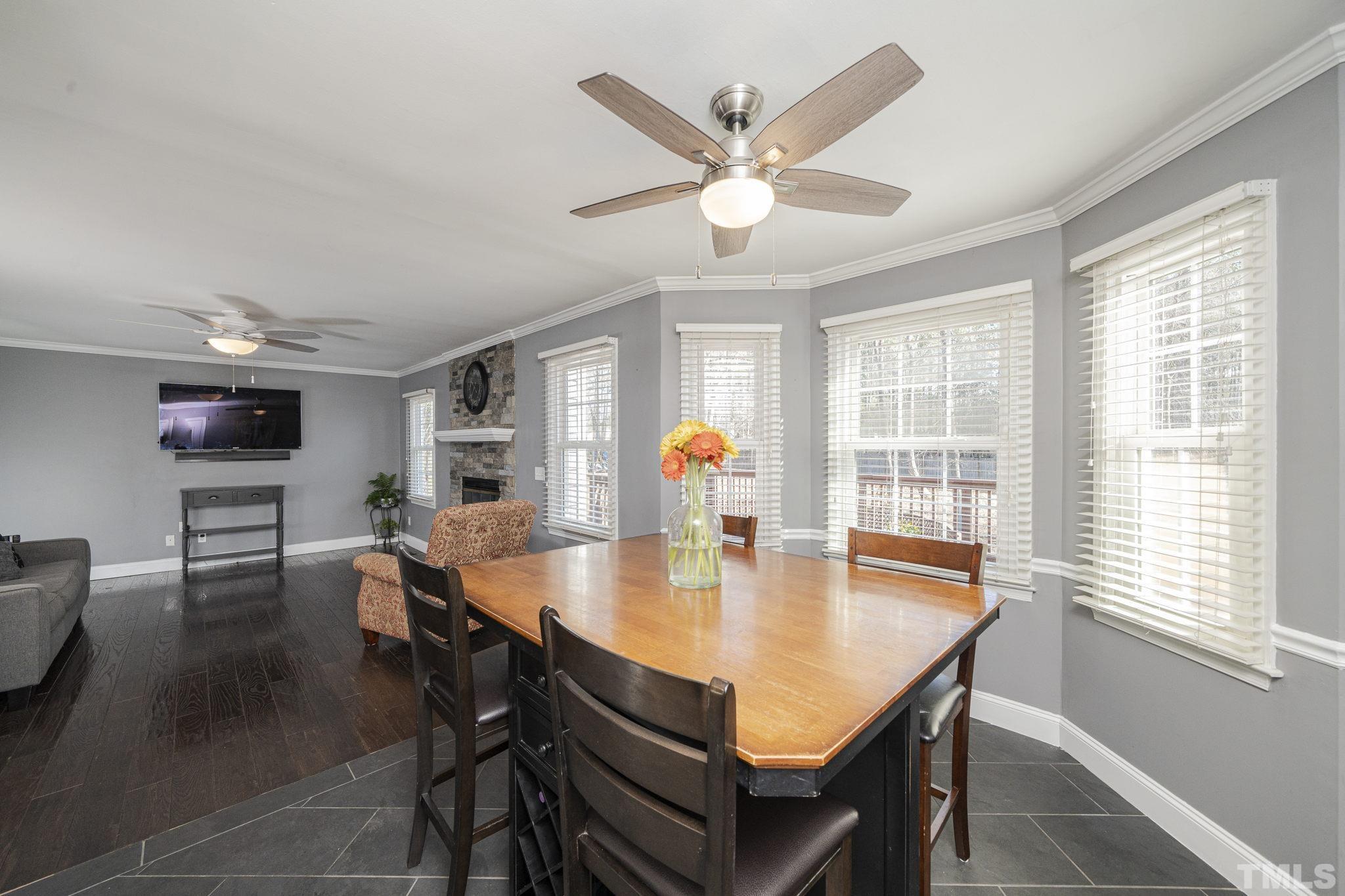 3500 Cartway Lane Raleigh, NC 27616 - Photo 8 of 35 a dining room with furniture window and wooden floor
