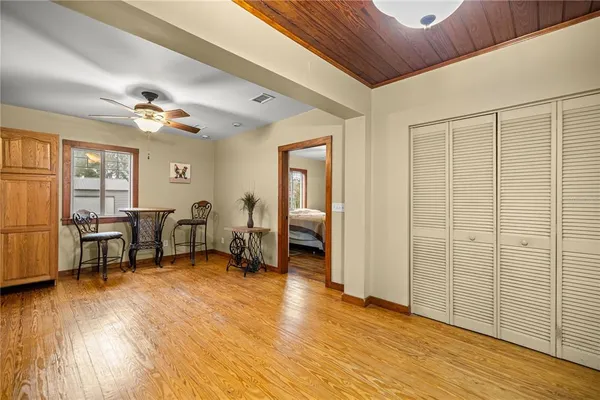 a view of a livingroom with furniture and a window