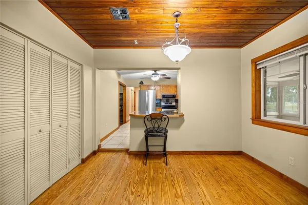 a view of a livingroom with furniture and wooden floor