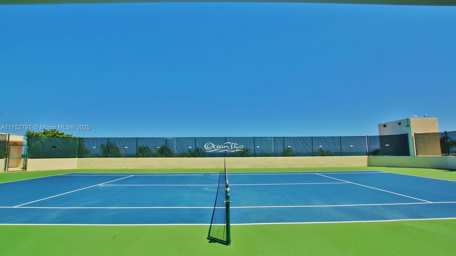 19111 Collins Avenue, Unit PH4 Sunny Isles Beach, FL 33160 - Photo 14 of 73 a view of a tennis court
