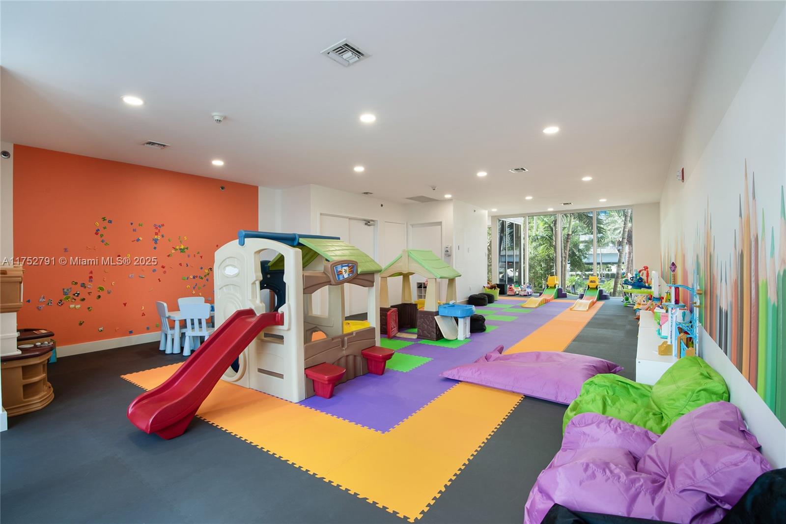 19111 Collins Avenue, Unit PH4 Sunny Isles Beach, FL 33160 - Photo 24 of 73 a view of a room with gym equipment