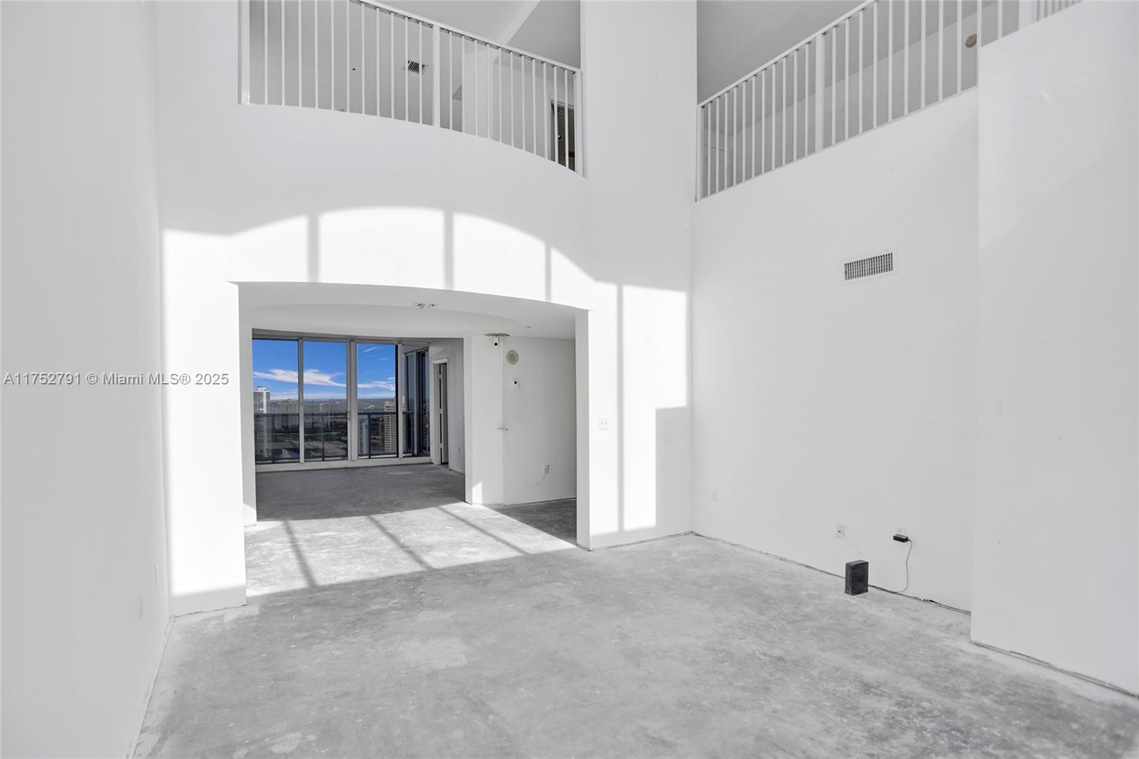19111 Collins Avenue, Unit PH4 Sunny Isles Beach, FL 33160 - Photo 35 of 73 a view of a hallway with entryway