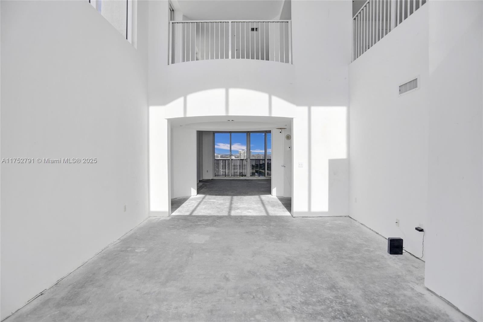 19111 Collins Avenue, Unit PH4 Sunny Isles Beach, FL 33160 - Photo 36 of 73 a view of an empty room and fire place