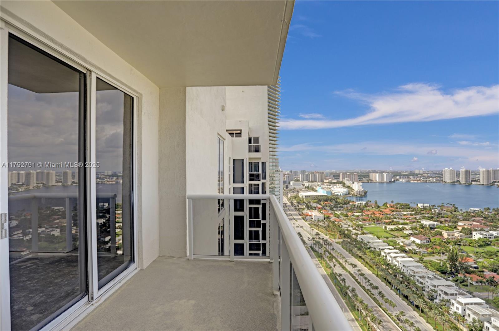 19111 Collins Avenue, Unit PH4 Sunny Isles Beach, FL 33160 - Photo 48 of 73 a view of a balcony with an ocean view