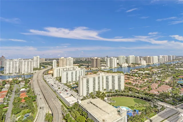 a view of a city with tall buildings