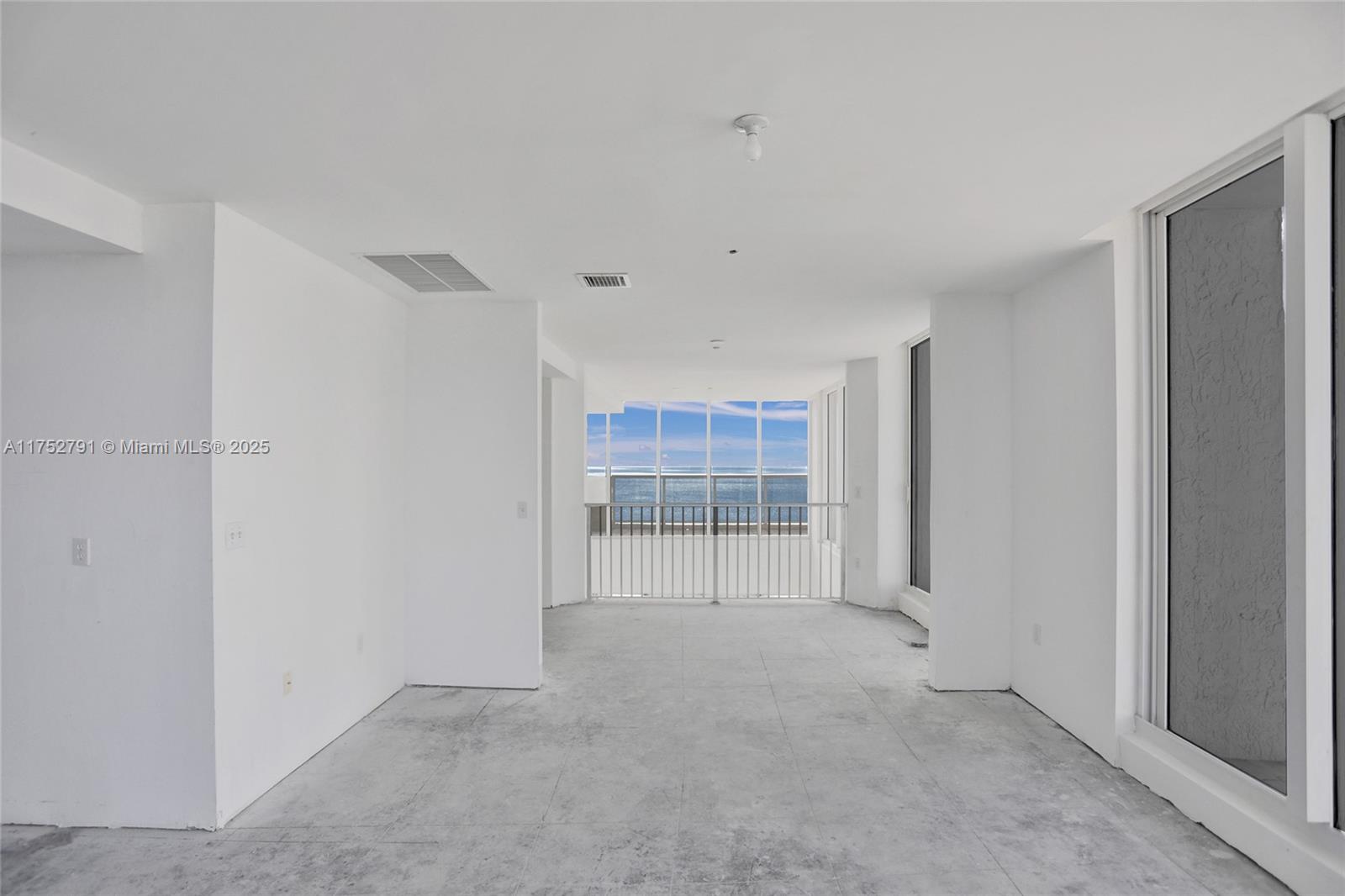 19111 Collins Avenue, Unit PH4 Sunny Isles Beach, FL 33160 - Photo 53 of 73 a view of an empty room with a window