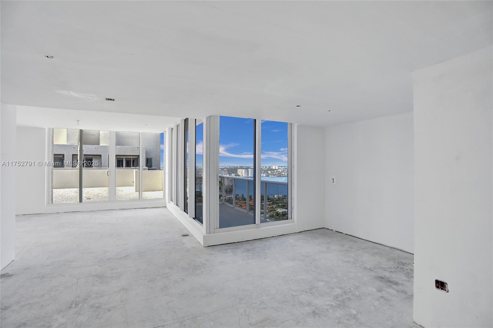 19111 Collins Avenue, Unit PH4 Sunny Isles Beach, FL 33160 - Photo 56 of 73 a view of an empty room with a window