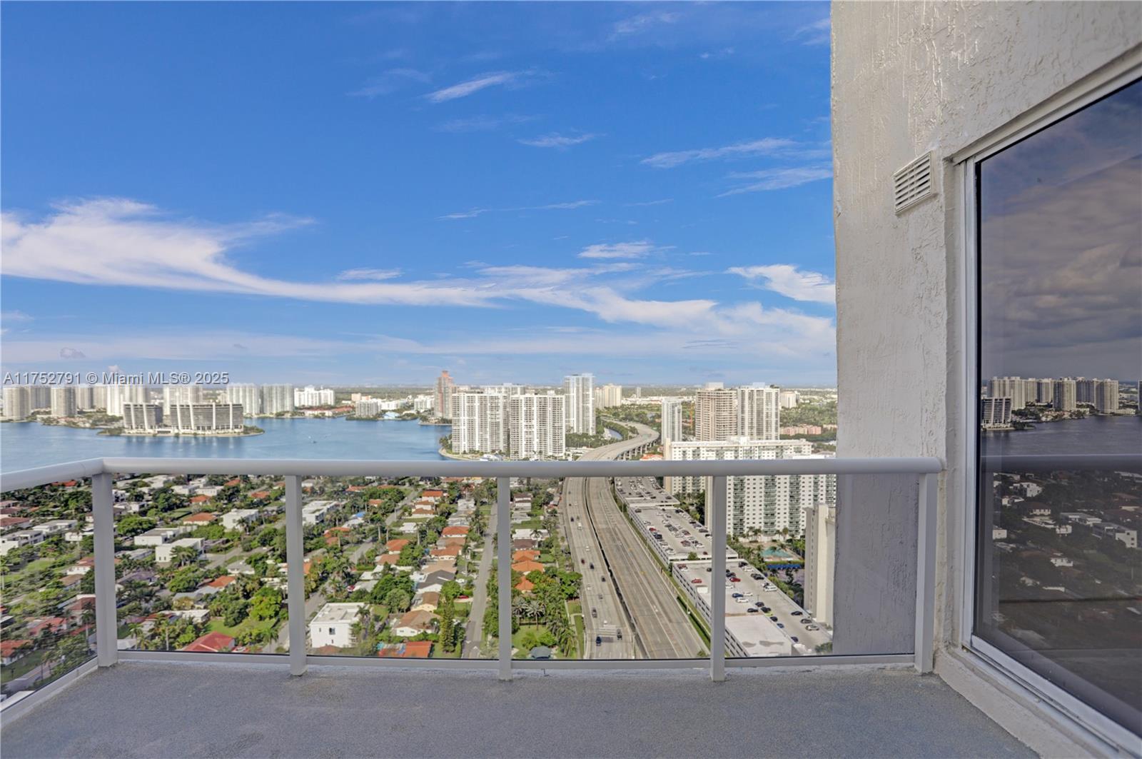 19111 Collins Avenue, Unit PH4 Sunny Isles Beach, FL 33160 - Photo 58 of 73 a view of a street with an ocean view