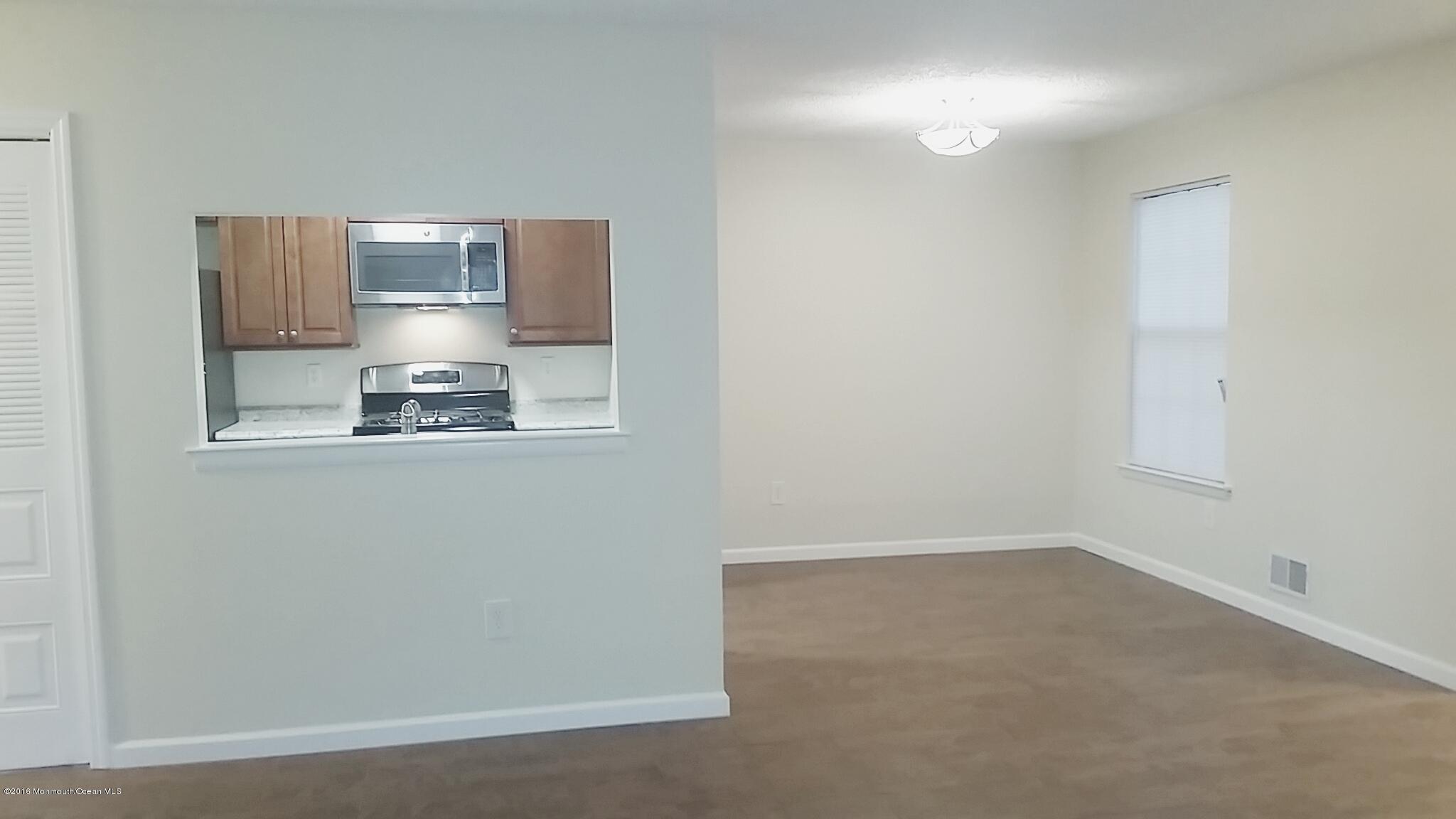 71 Azalea Circle Jackson, NJ 08527 - Photo 12 of 23 a bathroom with a sink and a mirror