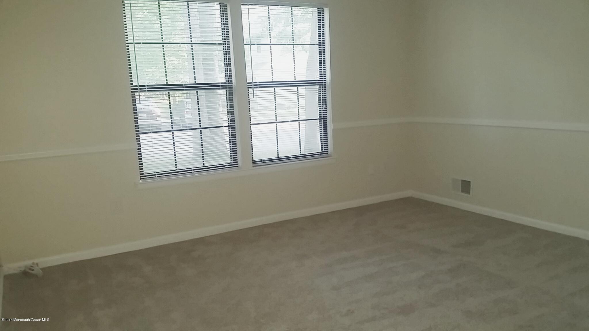 71 Azalea Circle Jackson, NJ 08527 - Photo 16 of 23 an empty room with a window
