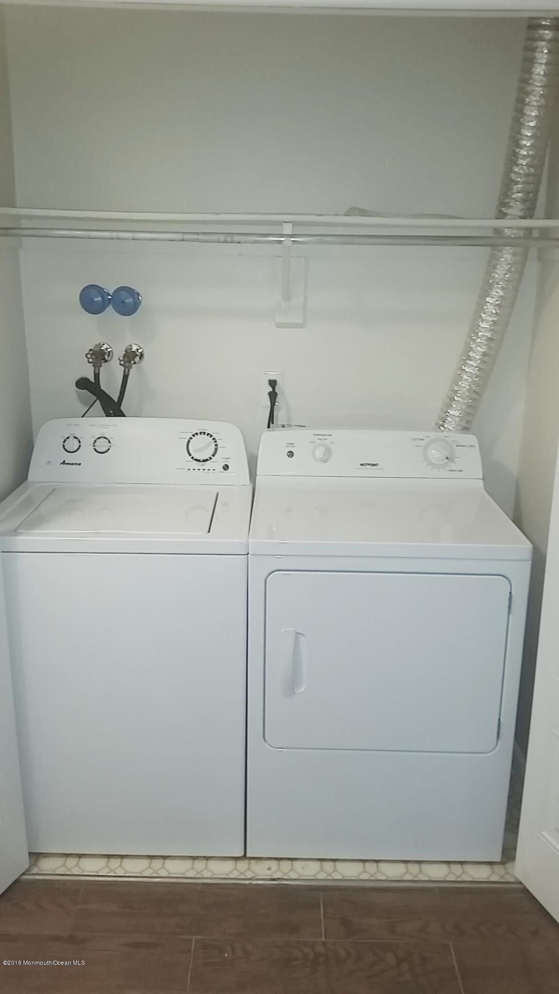 71 Azalea Circle Jackson, NJ 08527 - Photo 23 of 23 a utility room with dryer and washer