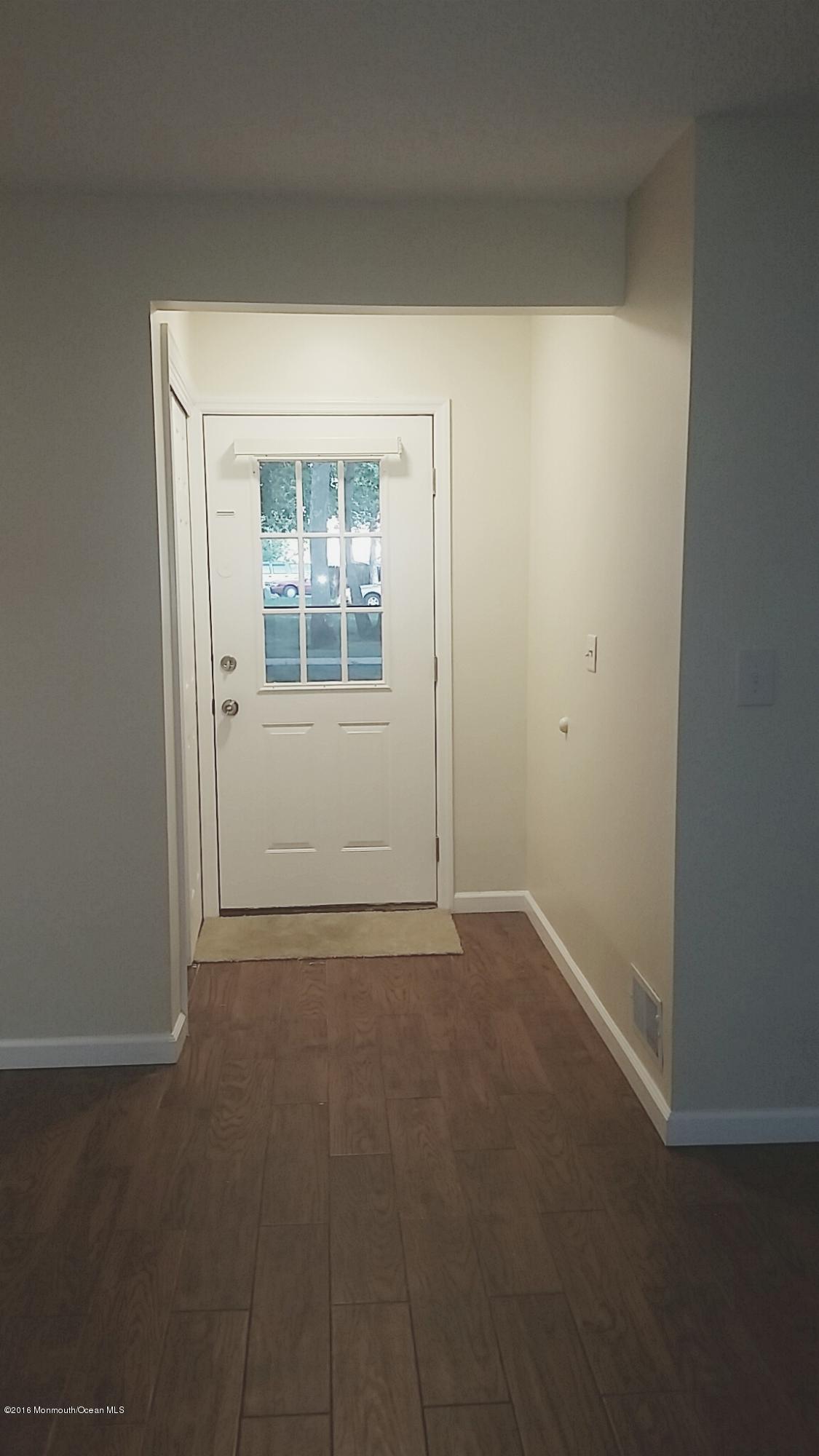 71 Azalea Circle Jackson, NJ 08527 - Photo 3 of 23 a view of an empty room with a window