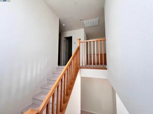 a storage room with wooden floor
