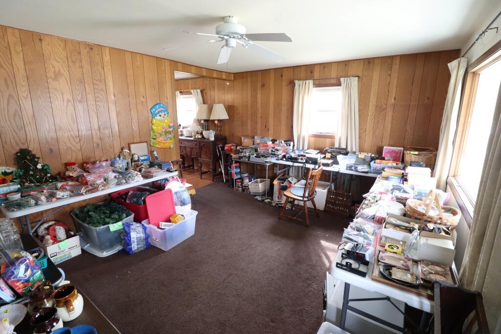 629 Superior Street Michigan City, IN 46360 - Photo 11 of 35 a living room with furniture and a window