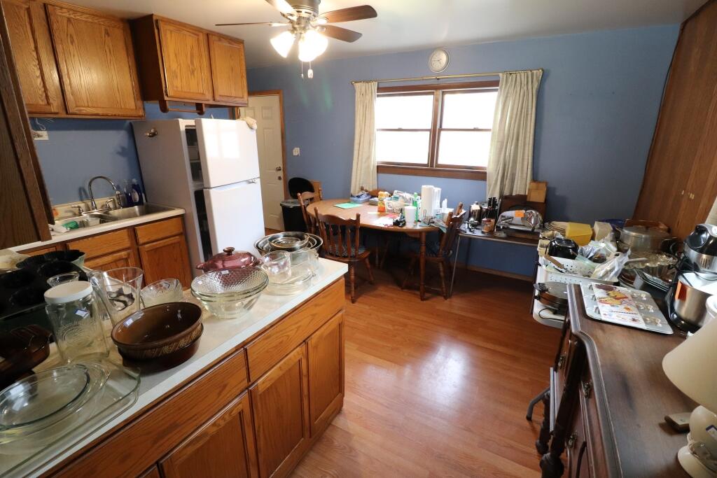 629 Superior Street Michigan City, IN 46360 - Photo 12 of 35 a kitchen with a sink appliances and cabinets