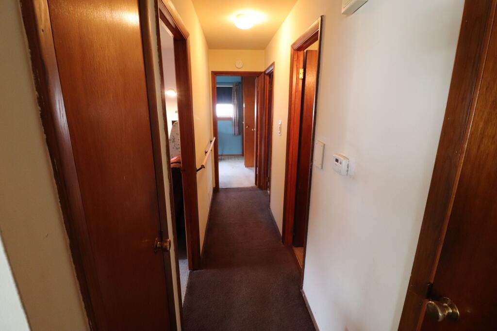 629 Superior Street Michigan City, IN 46360 - Photo 15 of 35 a view of a hallway