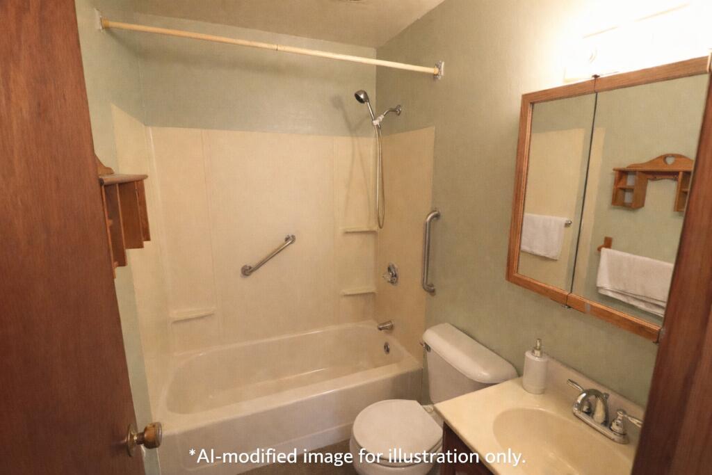 629 Superior Street Michigan City, IN 46360 - Photo 18 of 35 a bathroom with a sink toilet and shower