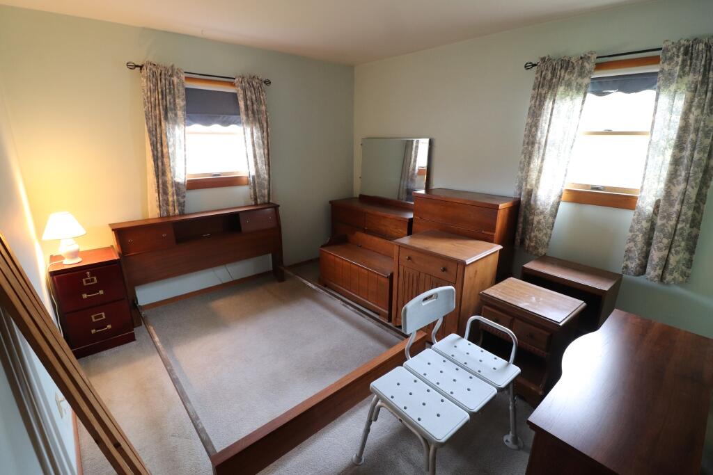629 Superior Street Michigan City, IN 46360 - Photo 22 of 35 a living room with furniture and a window