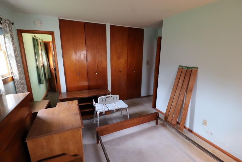 629 Superior Street Michigan City, IN 46360 - Photo 23 of 35 a room with furniture and a window