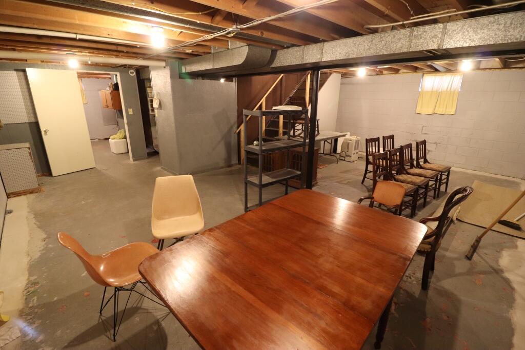 629 Superior Street Michigan City, IN 46360 - Photo 28 of 35 a view of a room with table and chairs