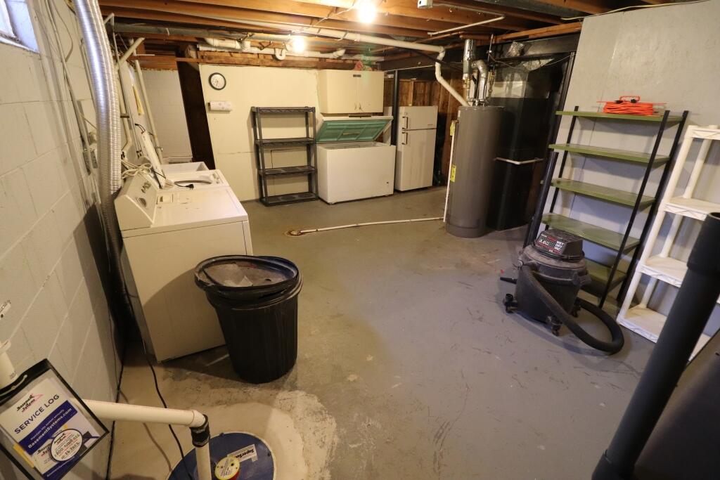 629 Superior Street Michigan City, IN 46360 - Photo 33 of 35 a utility room with dryer and washer