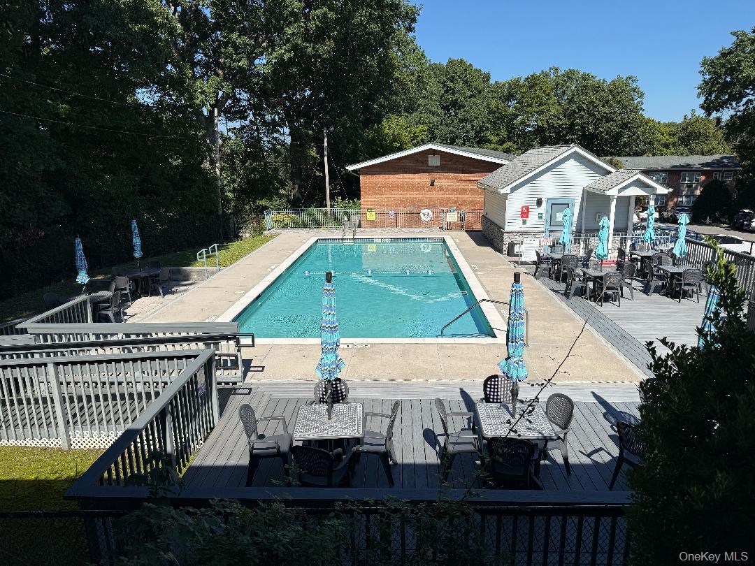 675 Pelham Road, Unit D14 New Rochelle, NY 10805 - Photo 8 of 9 Complex Pool outside your door with view from living room